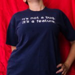 it's not a bug, it's a feature t-shirt